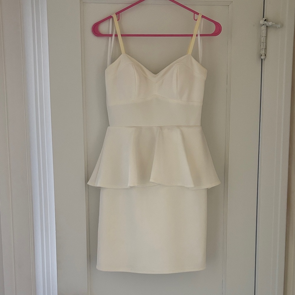 Elegant off white Peplum Dress